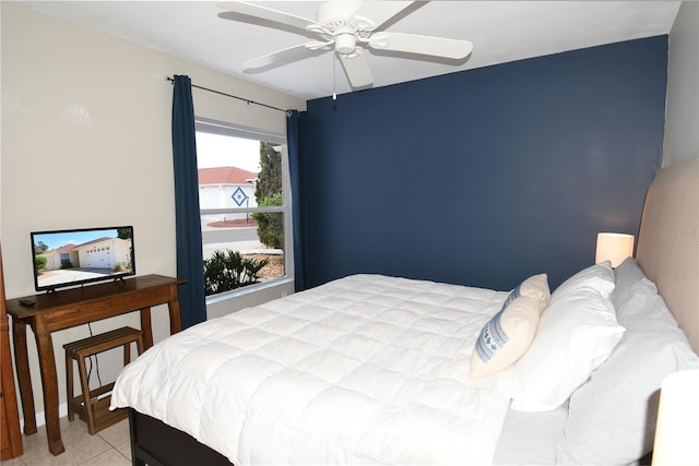 1325 Balboa Ct, The Villages, FL 32159 - bedroom featuring light tile patterned flooring and ceiling fan