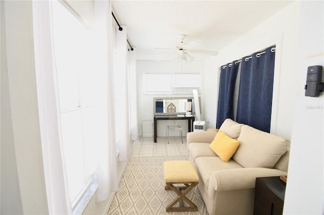 1325 Balboa Ct, The Villages, FL 32159 - living room featuring ceiling fan and tile patterned floors