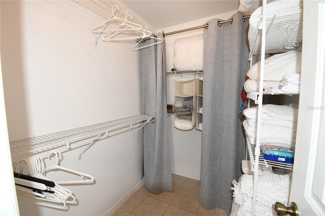 1325 Balboa Ct, The Villages, FL 32159 - spacious closet with light tile patterned floors
