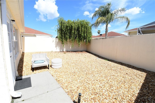 1325 Balboa Ct, The Villages, FL 32159 - fenced backyard featuring a patio