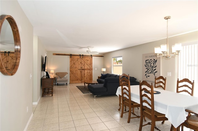 1325 Balboa Ct, The Villages, FL 32159 - dining room with a chandelier, a barn door, and light tile patterned flooring
