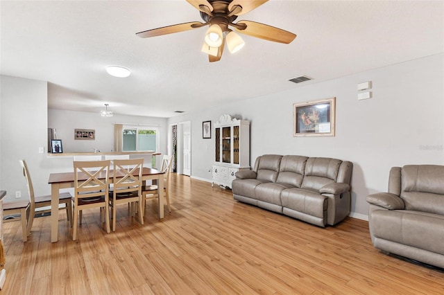 2336 Martins Run, Tavares, FL 32778 - dining space featuring light wood-type flooring and a ceiling fan