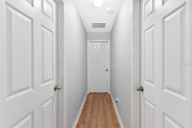 2336 Martins Run, Tavares, FL 32778 - corridor with baseboards and light wood-style floors