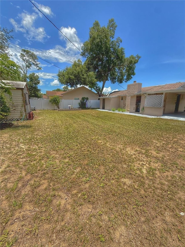 100 W Idlewild Ave, Eustis, FL 32726 - view of yard with a storage unit