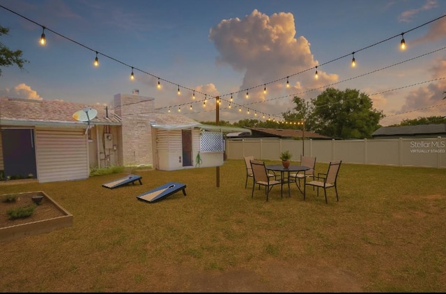 100 W Idlewild Ave, Eustis, FL 32726 - view of yard at dusk