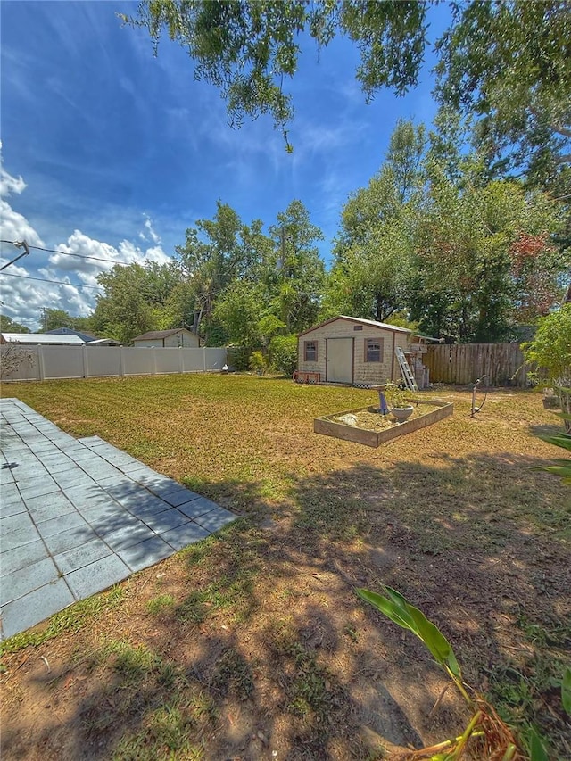 100 W Idlewild Ave, Eustis, FL 32726 - fenced backyard featuring an outbuilding and a patio