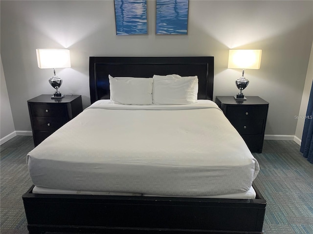 14501 Grove Resort Ave Unit 3406, Winter Garden, FL 34787 - bedroom featuring dark colored carpet and baseboards