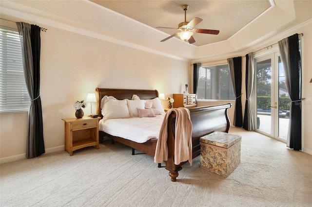 1426 Lakemist Ln, Clermont, FL 34711 - bedroom featuring access to exterior, a raised ceiling, carpet flooring, ornamental molding, and ceiling fan