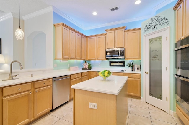 1426 Lakemist Ln, Clermont, FL 34711 - kitchen with appliances with stainless steel finishes, ornamental molding, light brown cabinets, light tile patterned flooring, and light countertops
