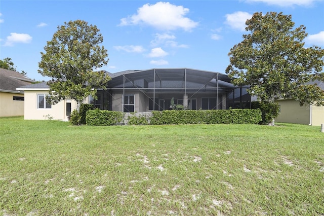 1426 Lakemist Ln, Clermont, FL 34711 - back of property with a yard and glass enclosure