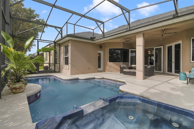 1426 Lakemist Ln, Clermont, FL 34711 - view of pool with a patio area, a ceiling fan, a pool with connected hot tub, glass enclosure, and french doors