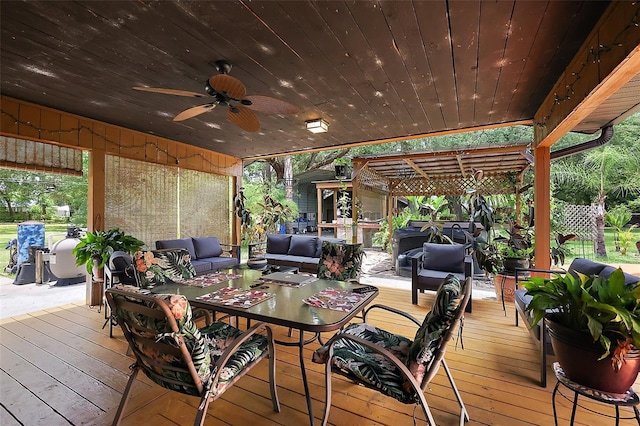 672 E Belt Ave, Bushnell, FL 33513 - wooden deck with outdoor lounge area and a ceiling fan