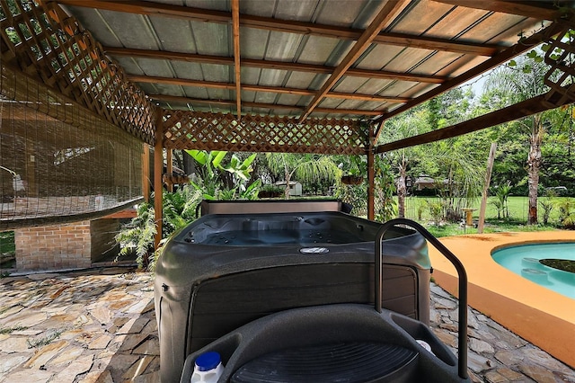 672 E Belt Ave, Bushnell, FL 33513 - view of patio featuring a hot tub
