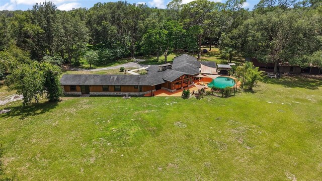 672 E Belt Ave, Bushnell, FL 33513 - view of subject property featuring a heavily wooded area