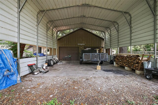 672 E Belt Ave, Bushnell, FL 33513 - view of parking / parking lot with a garage