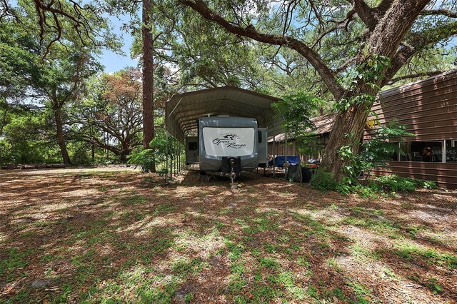 672 E Belt Ave, Bushnell, FL 33513 - view of yard with a detached carport