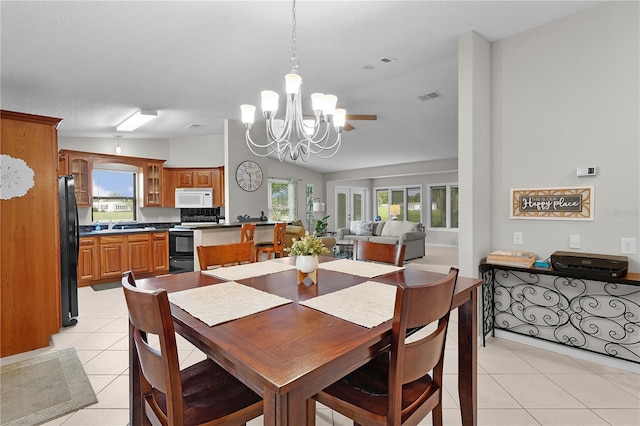 1815 Kaufman Cir, Lady Lake, FL 32159 - dining area featuring a chandelier and light tile patterned flooring