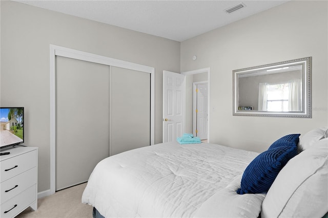 1815 Kaufman Cir, Lady Lake, FL 32159 - bedroom featuring light colored carpet and a closet