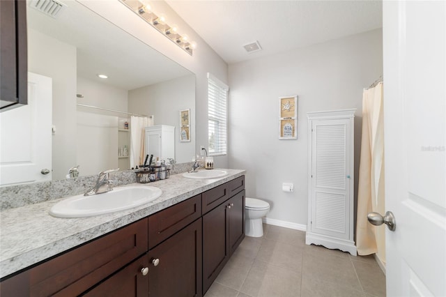 9785 Pepper Tree Trl, Wildwood, FL 34785 - full bathroom featuring double vanity, tile patterned floors, and curtained shower