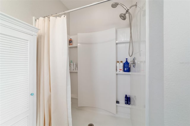 9785 Pepper Tree Trl, Wildwood, FL 34785 - bathroom with a shower stall