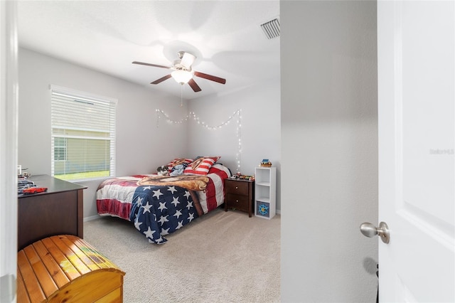 9785 Pepper Tree Trl, Wildwood, FL 34785 - bedroom with carpet floors and ceiling fan
