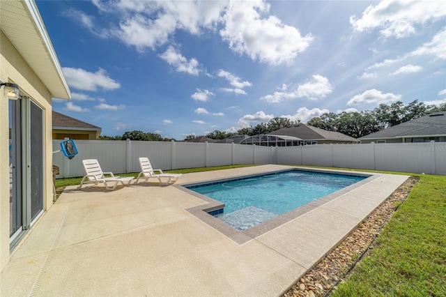 9785 Pepper Tree Trl, Wildwood, FL 34785 - view of swimming pool featuring a patio area and a fenced backyard