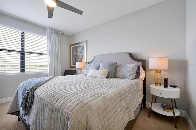 16300 County Road 455 Unit 202, Montverde, FL 34756 - carpeted bedroom featuring baseboards and ceiling fan