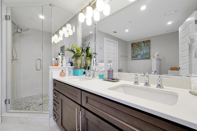 16300 County Road 455 Unit 202, Montverde, FL 34756 - full bath featuring double vanity, a stall shower, and recessed lighting