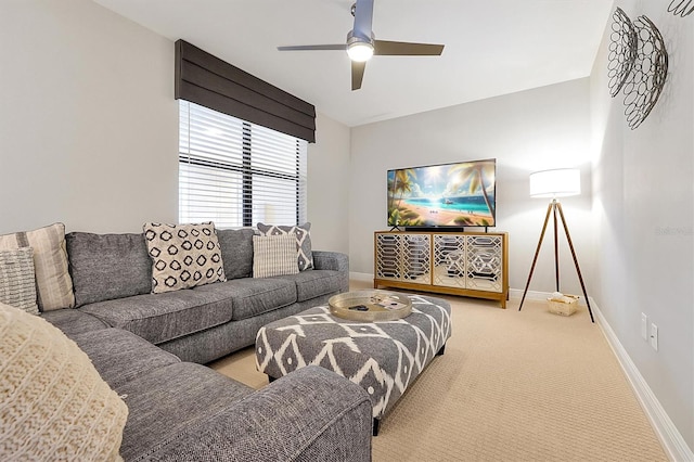 16300 County Road 455 Unit 202, Montverde, FL 34756 - living room with baseboards, a ceiling fan, and carpet floors