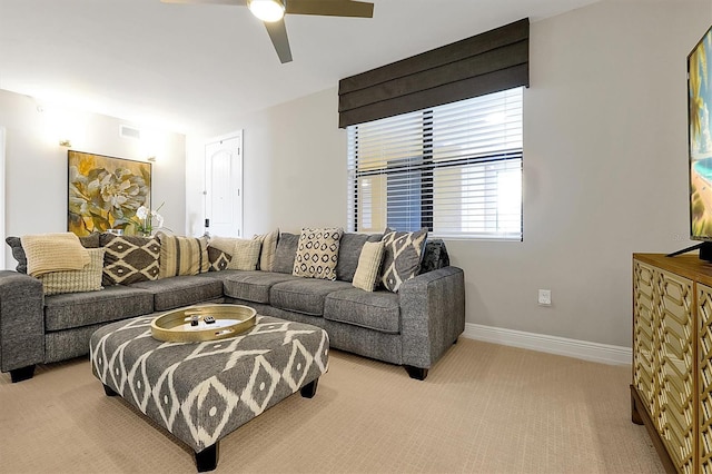 16300 County Road 455 Unit 202, Montverde, FL 34756 - living area featuring ceiling fan, carpet flooring, and baseboards