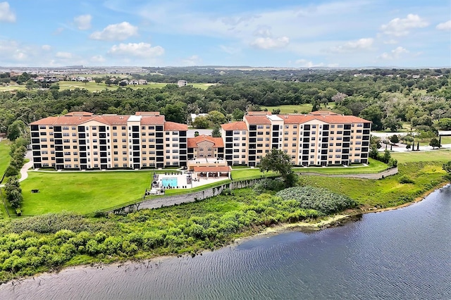 16300 County Road 455 Unit 202, Montverde, FL 34756 - drone / aerial view of a large body of water and apartment complex / building