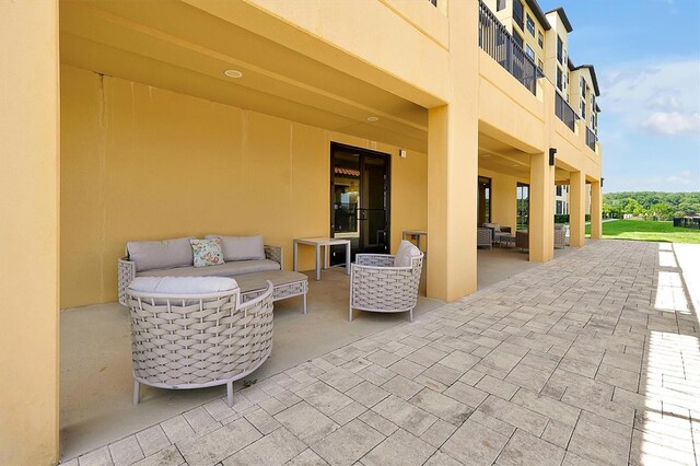 16300 County Road 455 Unit 202, Montverde, FL 34756 - view of patio featuring an outdoor hangout area