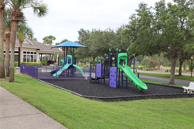 1355 Misty Glen Ln, Clermont, FL 34711 - community jungle gym featuring a lawn