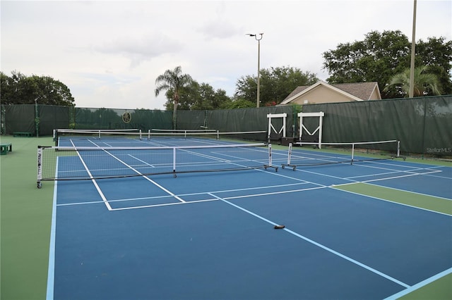 1355 Misty Glen Ln, Clermont, FL 34711 - view of tennis court featuring community basketball court