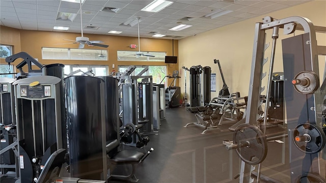 1355 Misty Glen Ln, Clermont, FL 34711 - workout area featuring ceiling fan, plenty of natural light, and a paneled ceiling