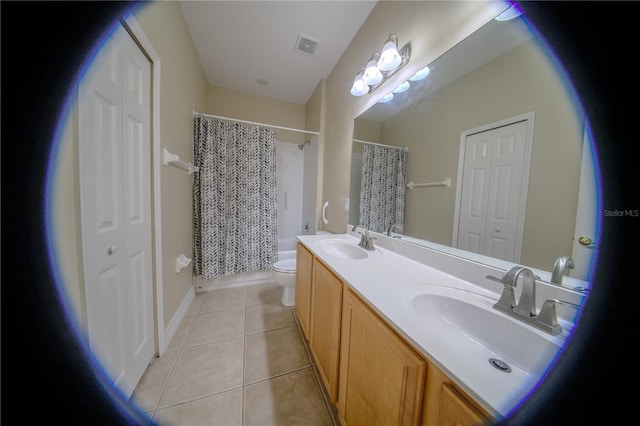 1355 Misty Glen Ln, Clermont, FL 34711 - full bathroom featuring double vanity, tile patterned floors, a closet, and shower / bath combo with shower curtain
