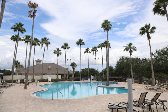 1355 Misty Glen Ln, Clermont, FL 34711 - community pool with a patio