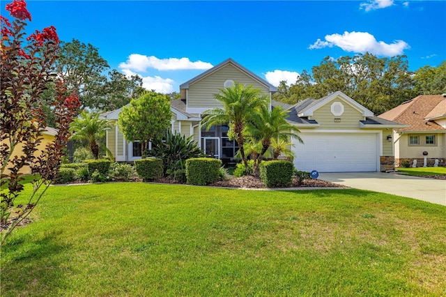 8045 Waterbury Way, Mount Dora, FL 32757 - obstructed view of property featuring driveway, an attached garage, and a front yard