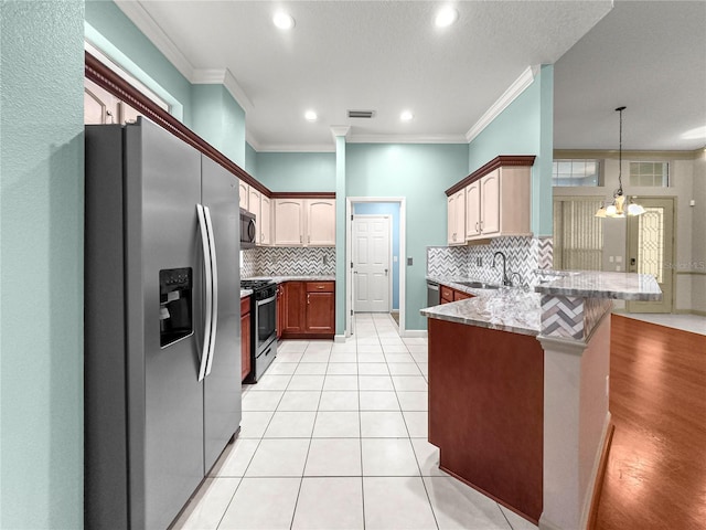 8045 Waterbury Way, Mount Dora, FL 32757 - kitchen with appliances with stainless steel finishes, a peninsula, ornamental molding, backsplash, and recessed lighting