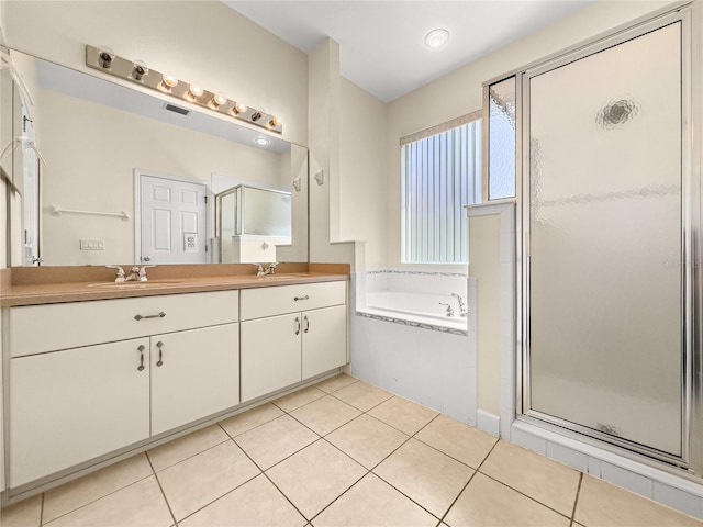 8045 Waterbury Way, Mount Dora, FL 32757 - full bath featuring double vanity, a stall shower, a garden tub, and tile patterned flooring