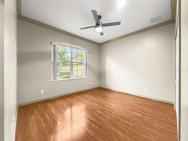 8045 Waterbury Way, Mount Dora, FL 32757 - unfurnished room featuring crown molding, wood finished floors, and a ceiling fan