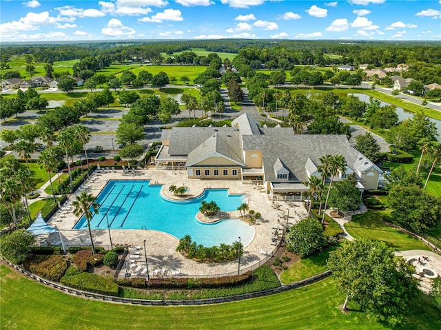 8045 Waterbury Way, Mount Dora, FL 32757 - community pool with a patio area