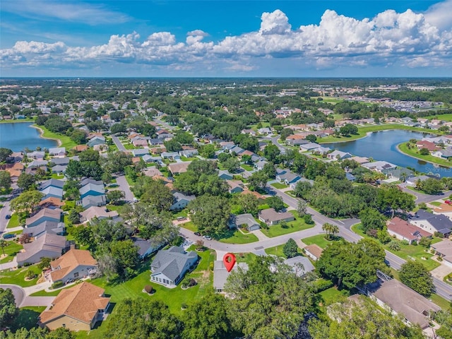206 Palermo Pl, Lady Lake, FL 32159 - aerial view of property and surrounding area featuring a large body of water and nearby suburban area