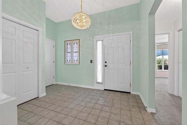 206 Palermo Pl, Lady Lake, FL 32159 - entryway featuring a chandelier and light tile patterned floors