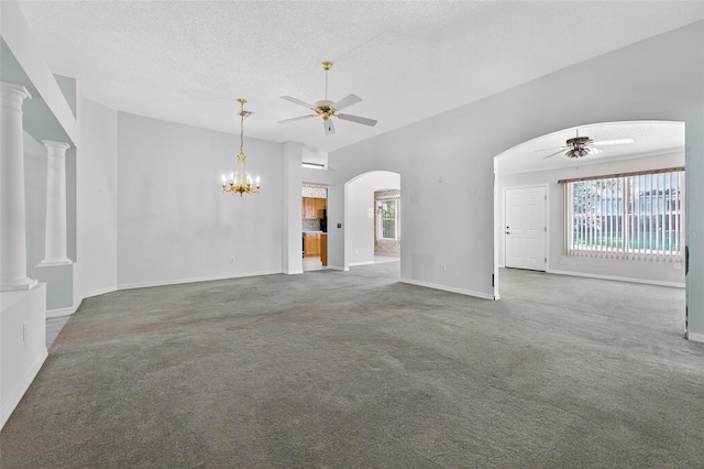 206 Palermo Pl, Lady Lake, FL 32159 - unfurnished living room featuring ceiling fan, carpet floors, plenty of natural light, and a textured ceiling