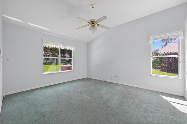 206 Palermo Pl, Lady Lake, FL 32159 - carpeted empty room with vaulted ceiling and ceiling fan