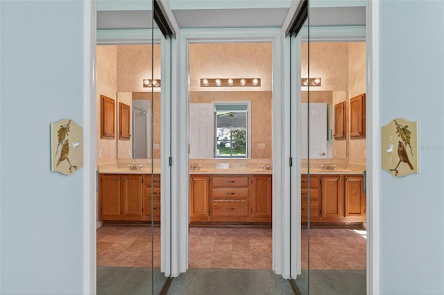 206 Palermo Pl, Lady Lake, FL 32159 - bathroom with two vanities and tile patterned flooring