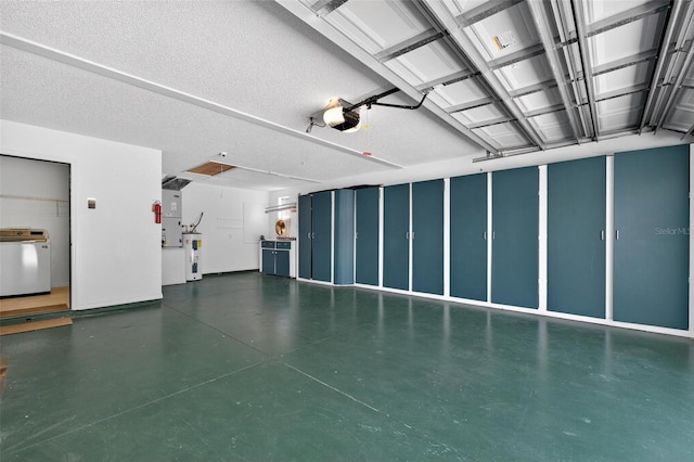 206 Palermo Pl, Lady Lake, FL 32159 - garage featuring a garage door opener, washer / dryer, and water heater