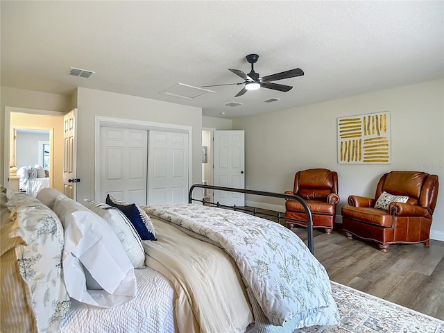 1611 Canal, Tavares, FL 32778 - bedroom featuring a closet, wood finished floors, attic access, and ceiling fan