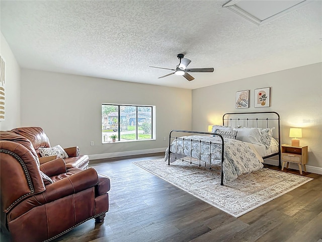 1611 Canal, Tavares, FL 32778 - bedroom with a textured ceiling, dark wood finished floors, a ceiling fan, and attic access